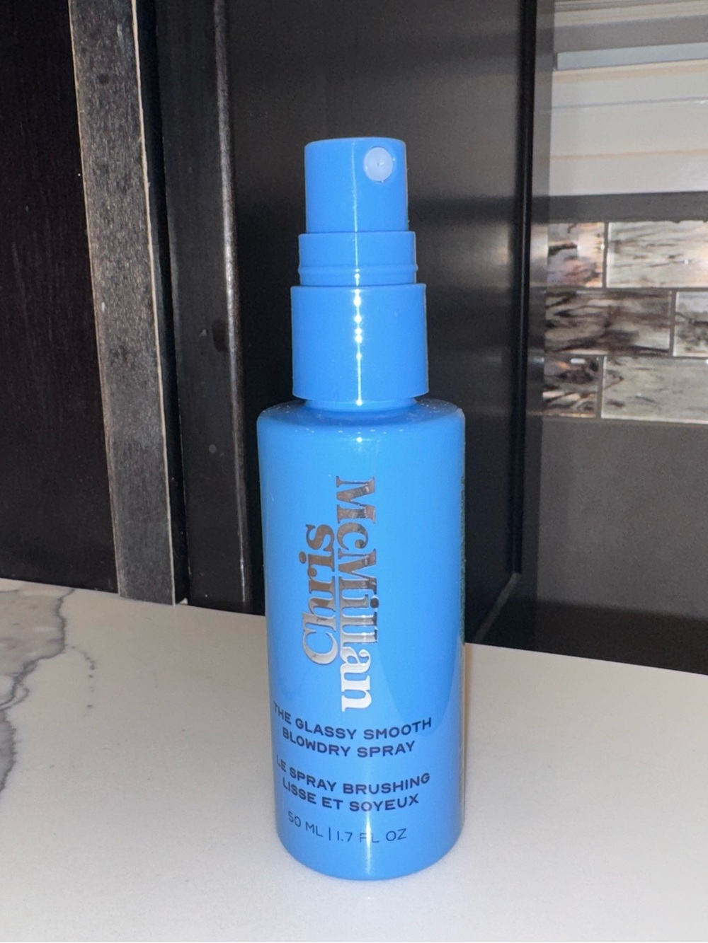 Chris McMillan The Glassy Smooth Blowdry Spray in the 1.7 fl oz (50 mL) travel